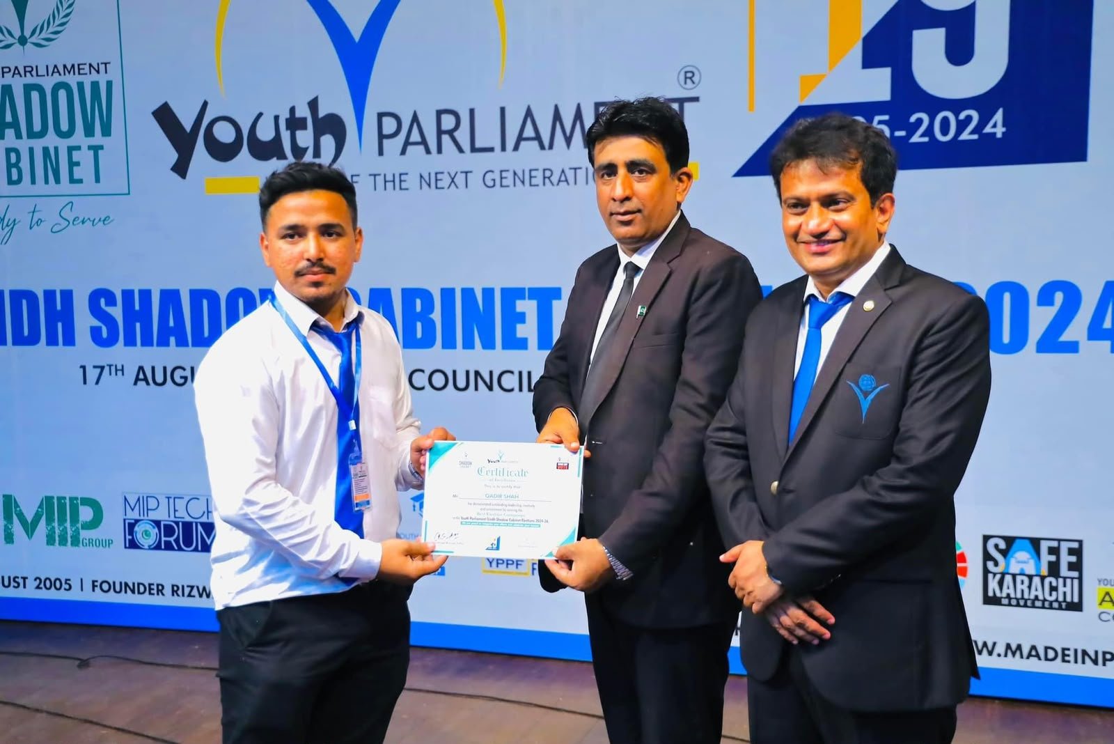 Syed Qadar Shah receiving recognition from Youth Parliament Pakistan in 2024